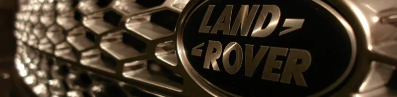 Het Land Rover-embleem op een grille